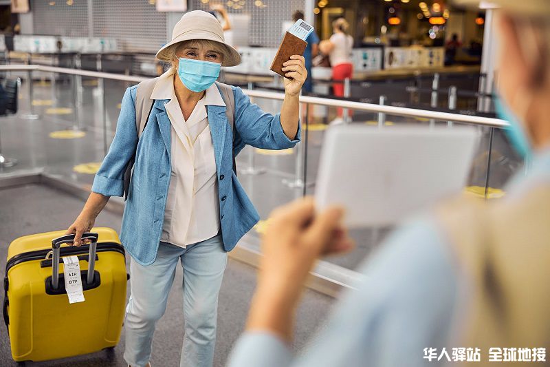 Woman wearing mask in airport.jpg